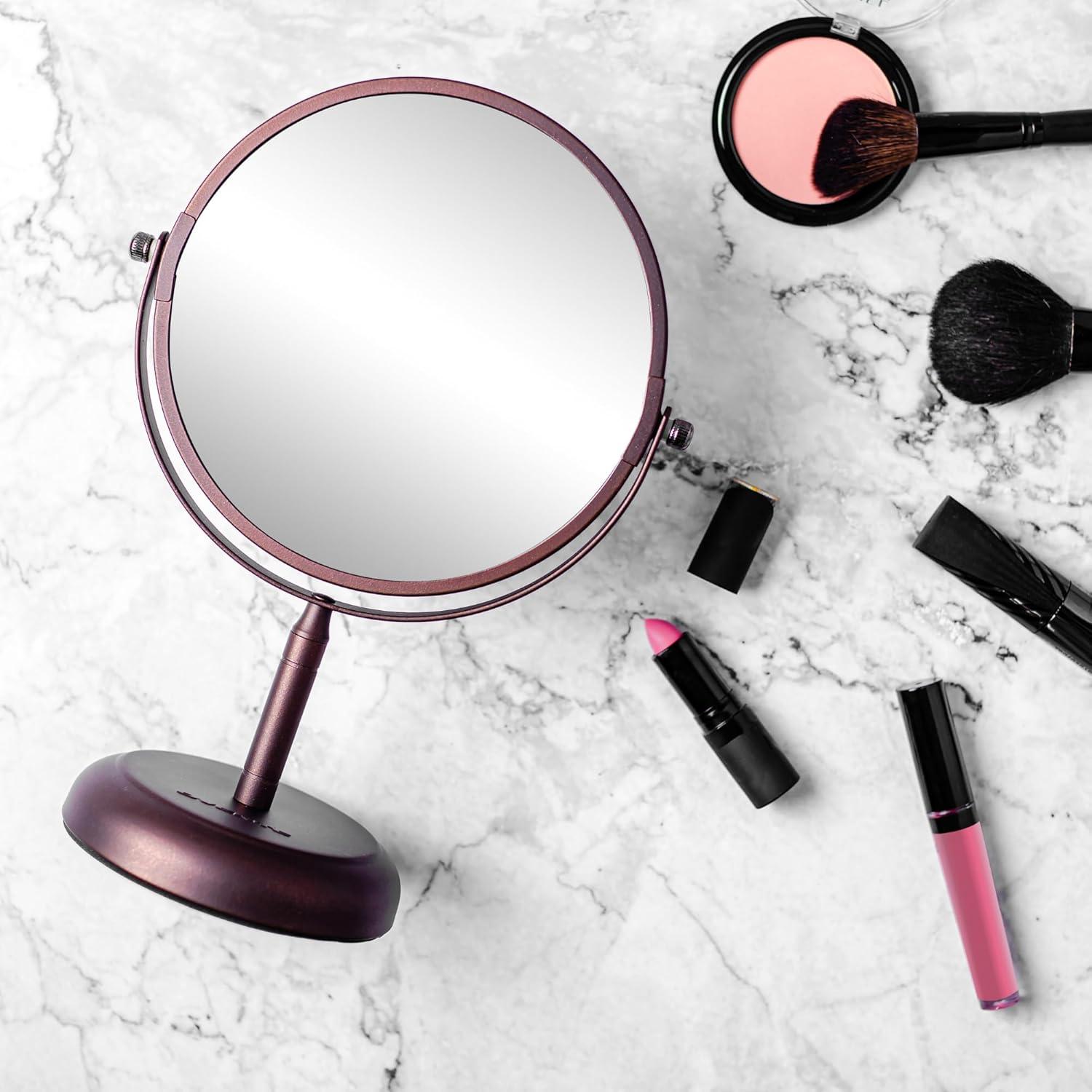 imageOVENTE 8 Tabletop Makeup Mirror with 1X7X Magnification 360 Swivel Design and DoubleSided FreeStanding Vanity Mirror Perfect for Dresser Bedroom and Office Desk Antique Bronze MNLAT80ABZ1X7XAntique Bronze