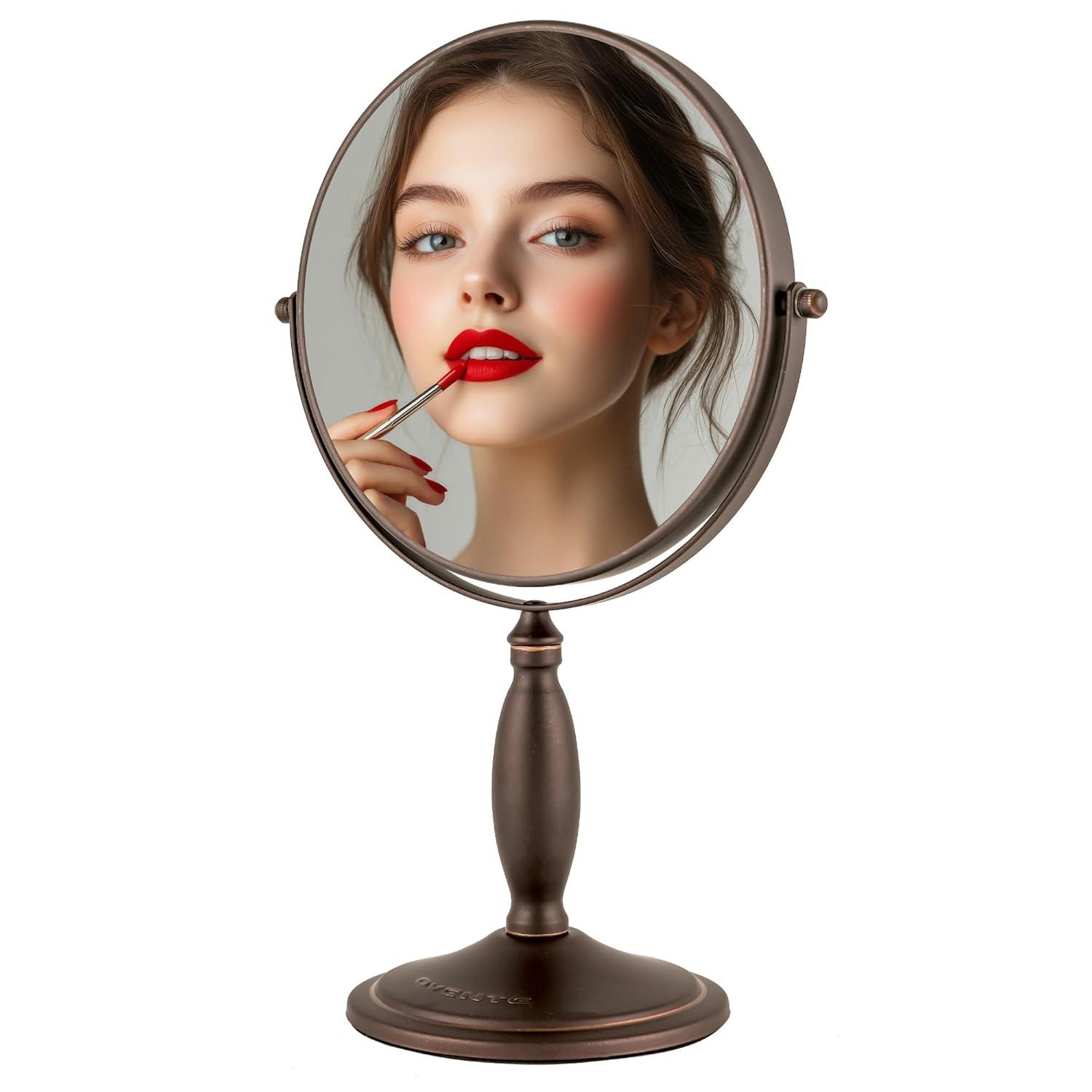 imageOVENTE 8 Tabletop Makeup Mirror with 1X7X Magnification 360 Swivel Design and DoubleSided FreeStanding Vanity Mirror Perfect for Dresser Bedroom and Office Desk Antique Bronze MNLAT80ABZ1X7XAntique Bronze