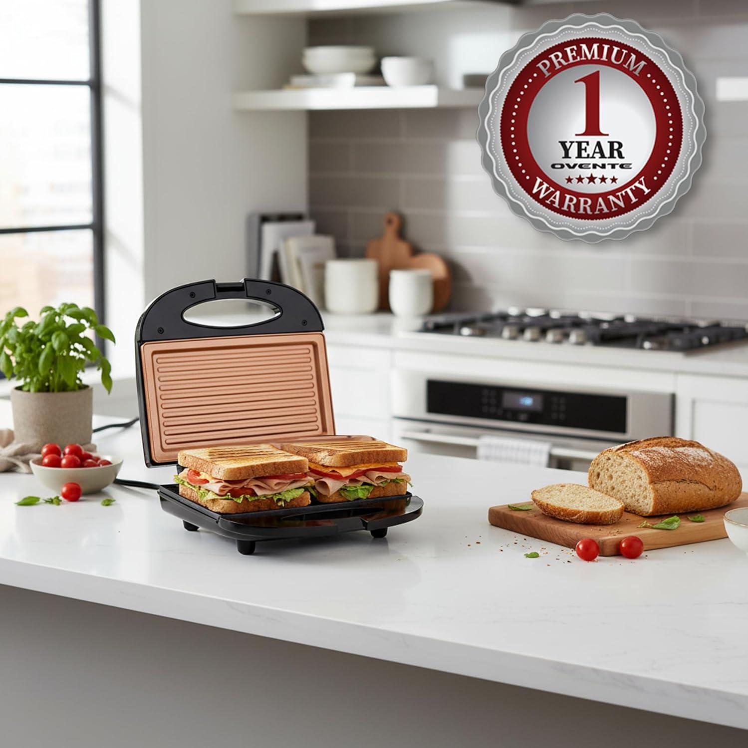 imageOVENTE Electric Indoor Panini Press Grill and Sandwich Maker with NonStick Coated Plates CoolTouch Handle and Removable Drip Tray Opens 180 Degrees to Fit Any Type or Size of Food Red GP0620RGP0110CO