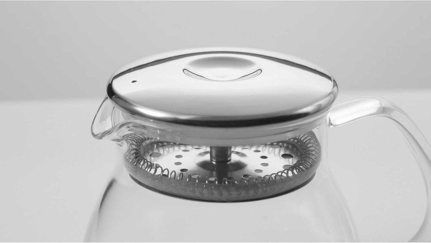 imageOvente Glass Teapot with High Grade Stainless Steel Infuser 27 Ounce with Free Measuring Scoop Heat Tempered Borosilicate Teapot Warmer with Leak and Spill Proof Technology Clear FGB27T