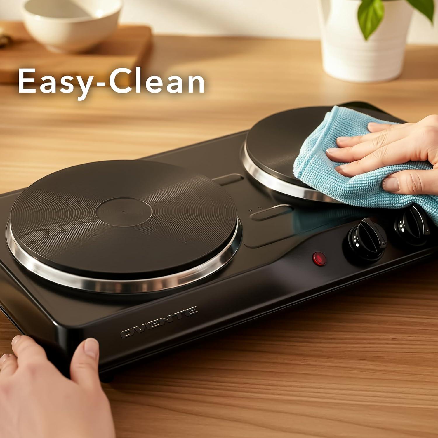 imageOVENTE Electric Countertop Single Burner 1000W Cooktop with 725 Inch Cast Iron Hot Plate 5 Level Temperature Control Compact Cooking Stove and Easy to Clean Stainless Steel Base Silver BGS101SBGS102B Black