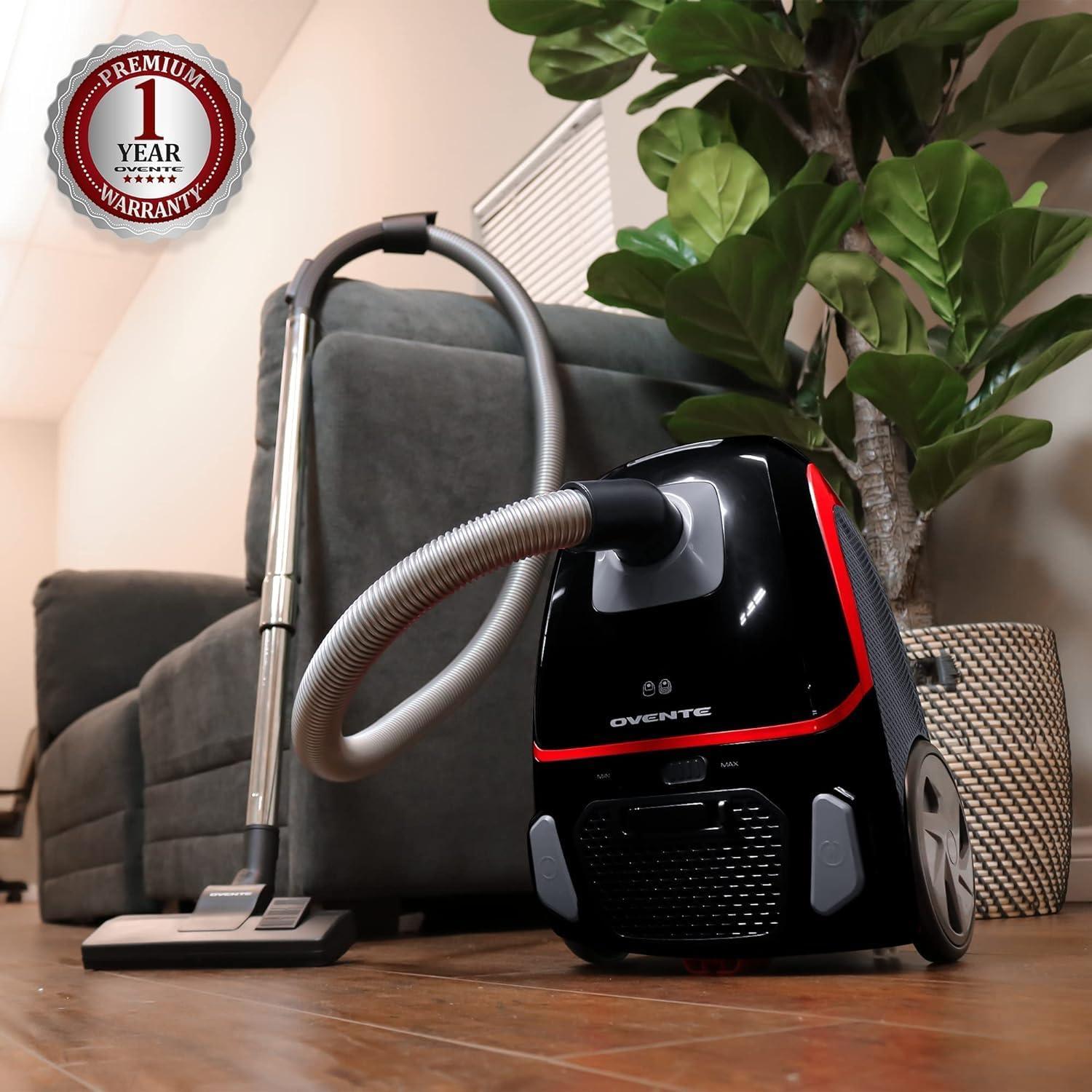 imageOVENTE Bagless Canister Vacuum Cleaner with Powerful MultiSurface Suction Telescoping Wand and Automatic Cord Rewind Lightweight Corded Cleaning Machine with SofaPet Brush Included Black ST2010St1600b Acpst16041