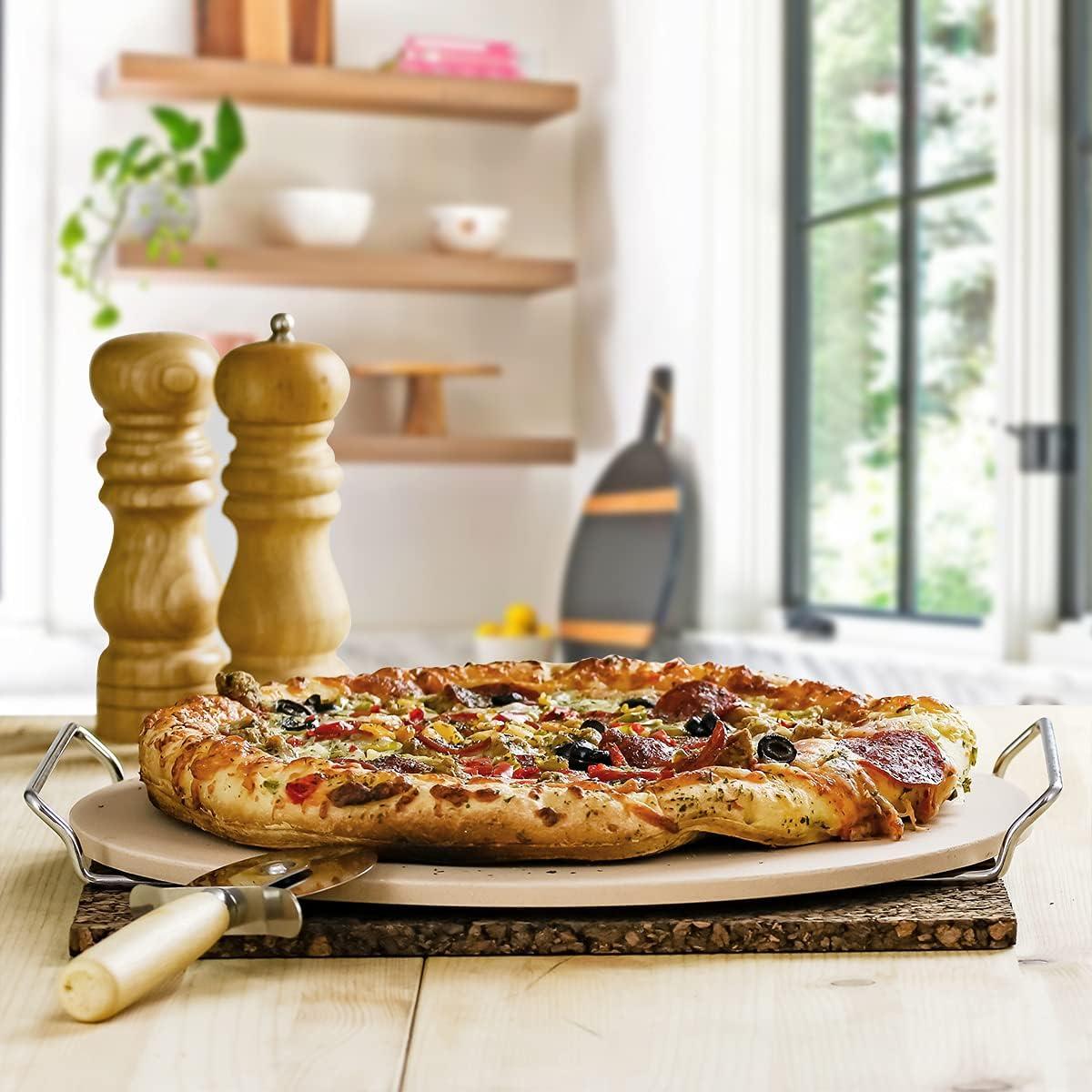imageOVENTE 13 Round Pizza Stone for Oven and Grill Heat Resistant Ceramic Flat Baking Stone with Cutter Wheel Metal Rack Stand Ideal for Making Crisp Crust Pizza Bread Cookies amp More Beige BW10132